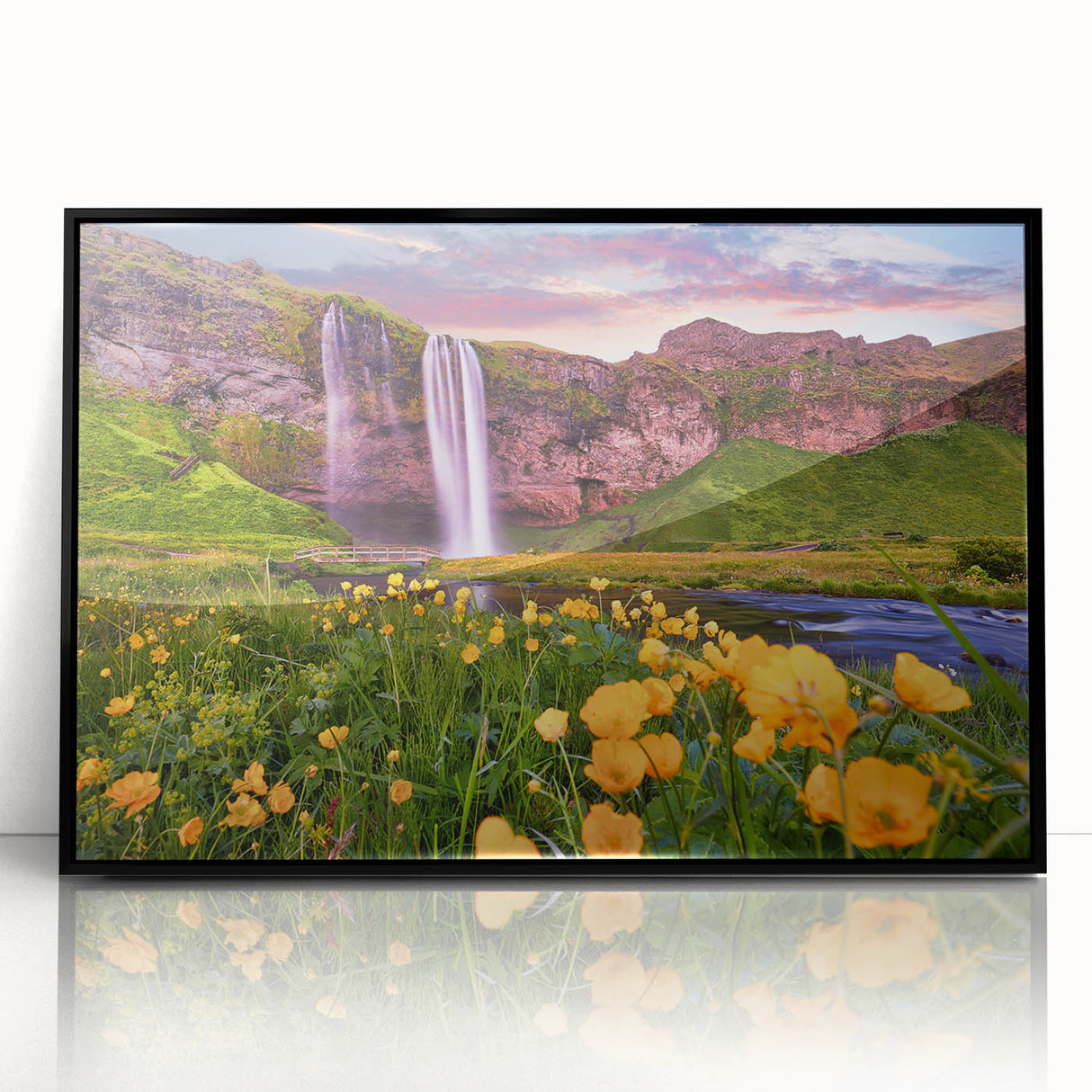 Large abstract wall art featuring an Icelandic landscape in muted gray and blue tones, framed in black acrylic.