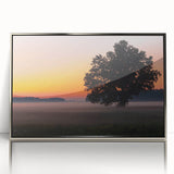 Large art print of a European Latvia scenery in muted earth tones on a silver-framed acrylic.