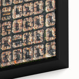 Black wall art featuring a textured depiction of Barcelona with vibrant, colorful details on a framed canvas.