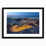 Abstract art print featuring textured, colorful art of a Middle Eastern scenery in an extra large black frame.