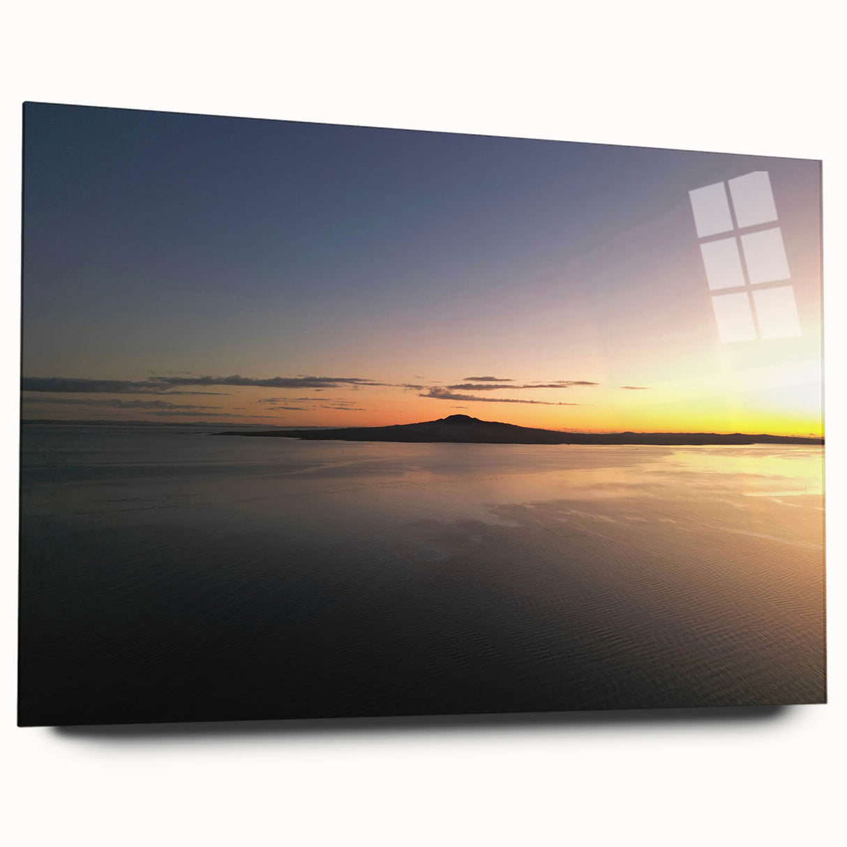 Large abstract print of Auckland's skyline in muted blues and greens on acrylic glass.