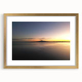 Extra large abstract art print of Auckland scenery in vibrant hues on a textured canvas, framed in gold.