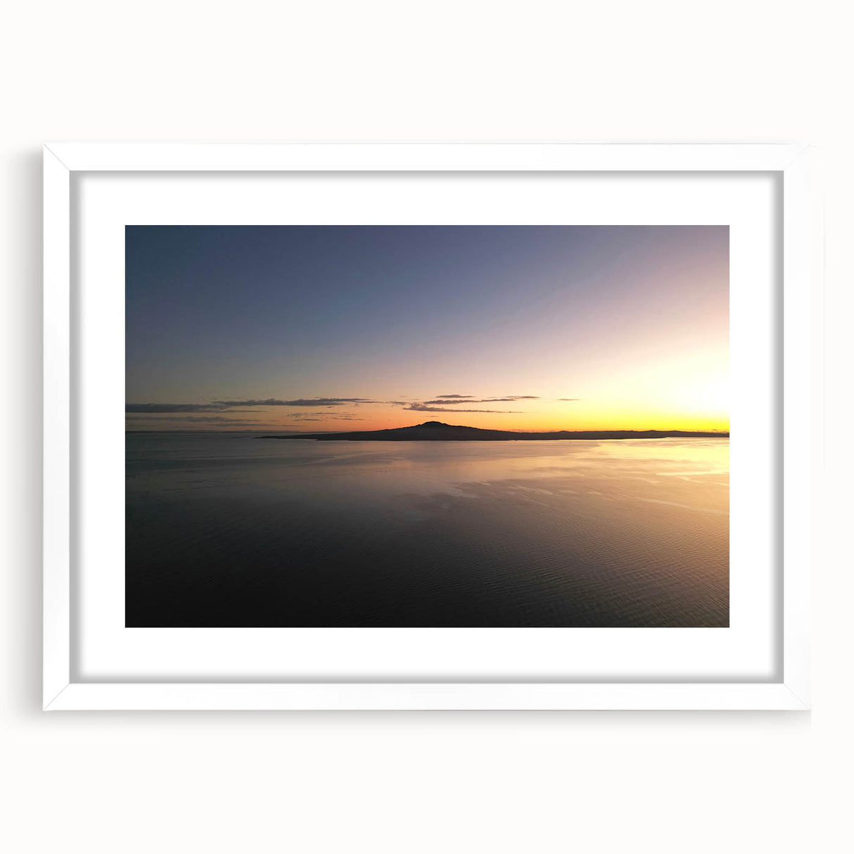 Abstract art print of Auckland skyline in muted blue and gray tones on a framed white mat.
