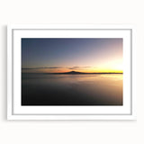 Abstract art print of Auckland skyline in muted blue and gray tones on a framed white mat.