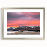 Textured art depicting an abstract New Zealand Canterbury scenery in muted earth tones on a framed silver mat.