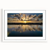 Abstract art print of Daytona scenery in muted blue and gray tones, framed with a white mat.