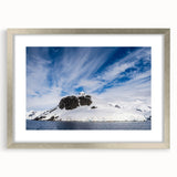 Textured art of Charlotte skyline in muted grays and blues on a framed silver mat, suitable for bedroom decor.