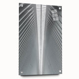 Large abstract wall art depicting the Seattle skyline in muted blue tones on acrylic glass.