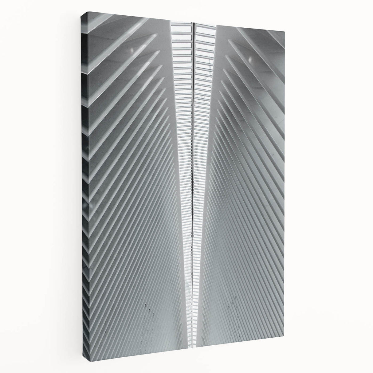 Side view of a large stretched canvas featuring a detailed Seattle skyline in muted blue and gray tones.