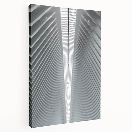 Side view of a large stretched canvas featuring a detailed Seattle skyline in muted blue and gray tones.