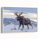 Vintage poster art of the Grand Tetons in muted earth tones on a framed canvas, ideal for living room decor.