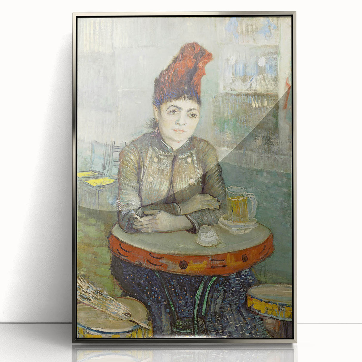 Large art print of a Van Gogh-inspired abstract painting in a silver frame, featuring swirling blue and yellow tones.