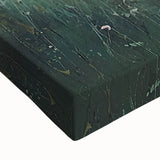 Close-up of a vibrant abstract floral canvas print showcasing bold colors like deep blue and bright pink, perfect for modern home decor or art enthusiasts.