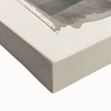 Close-up of a stretched canvas featuring abstract minimalist wall art design with soft pastel colors and fluid shapes, adding a modern touch to home decor.