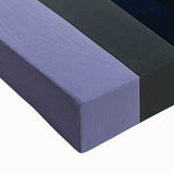 Close-up of an abstract geometric stretched canvas artwork showcasing vibrant colors and intricate patterns, ideal for modern home decor and artistic displays.