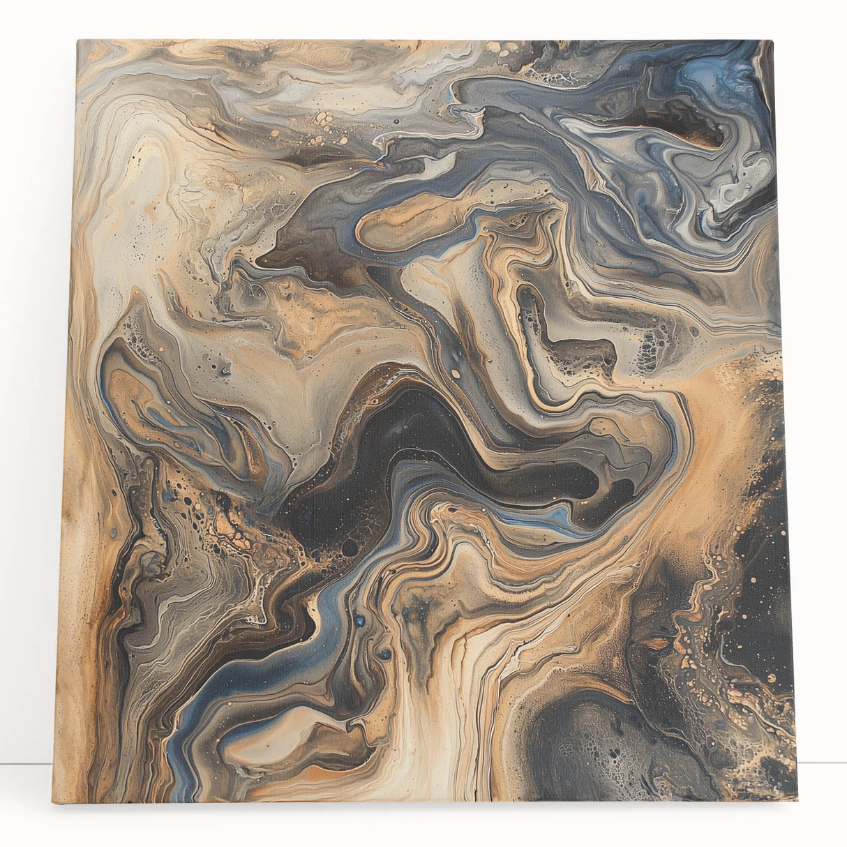 Abstract splatter art canvas with vibrant blue, orange, and yellow colors, leaning against a textured wall, perfect for modern home decor and artistic expression.
