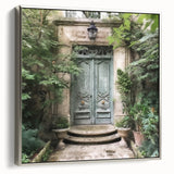 Framed canvas featuring a vintage poster of a French door in black with colorful accents.