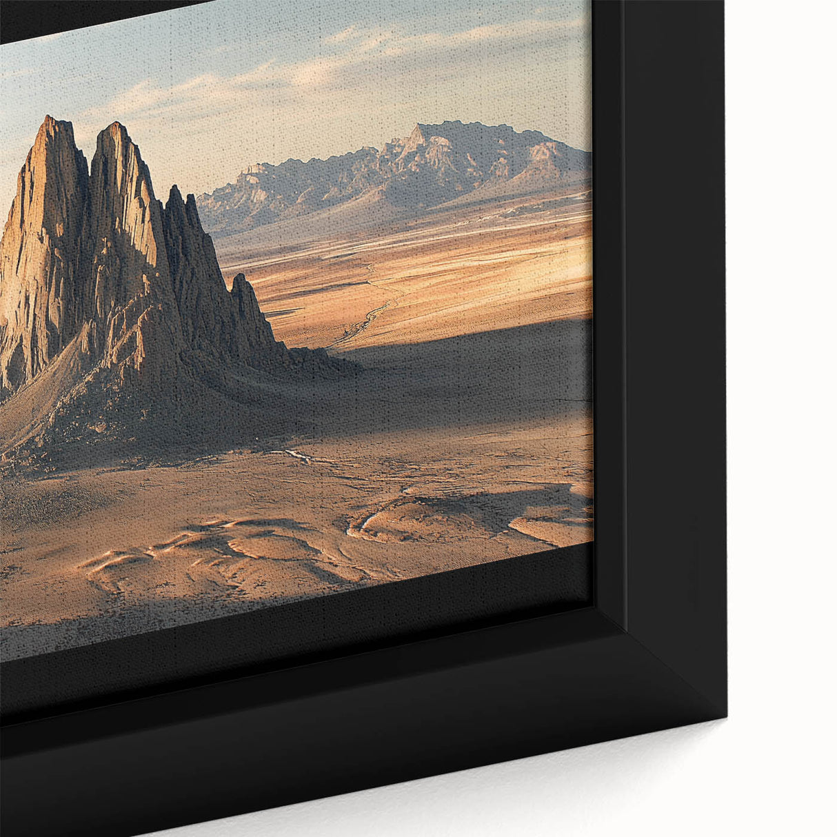 Close-up of a beautifully framed canvas artwork depicting a vibrant desert landscape with warm earth tones, showcasing intricate details and textures. Ideal for modern home decor.