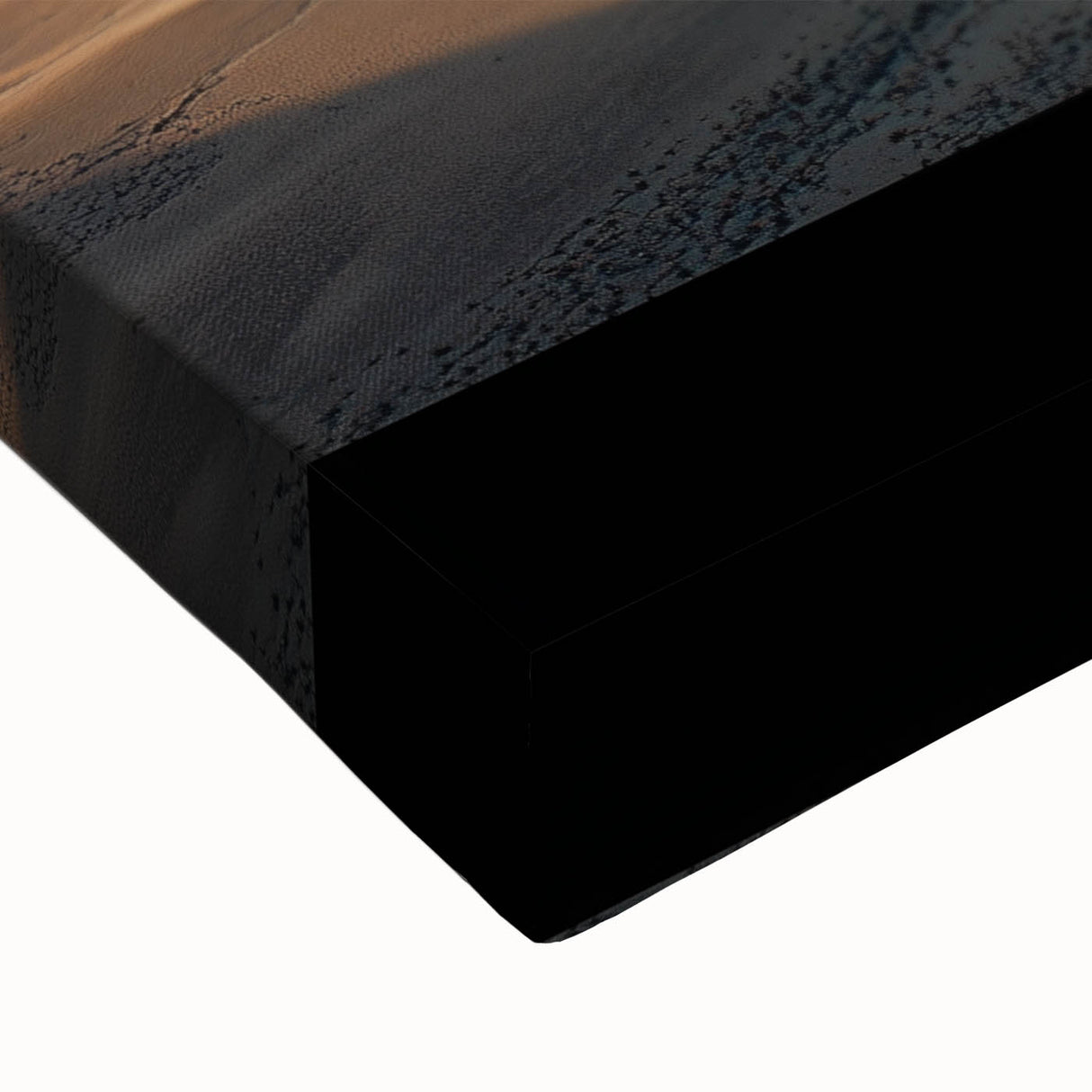 Close-up of a stretched canvas featuring a vibrant desert landscape with warm earthy tones, showcasing intricate details of sand dunes and a clear blue sky, perfect for home decor.