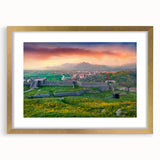 Abstract art print of a European Albanian landscape in gold frame with mat, featuring muted earth tones.