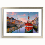 Extra large abstract art print of a European scenery in muted earth tones, framed in silver, ideal for living room decor.