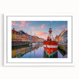 Textured abstract art print depicting a serene European landscape in muted earth tones, framed with a white mat.