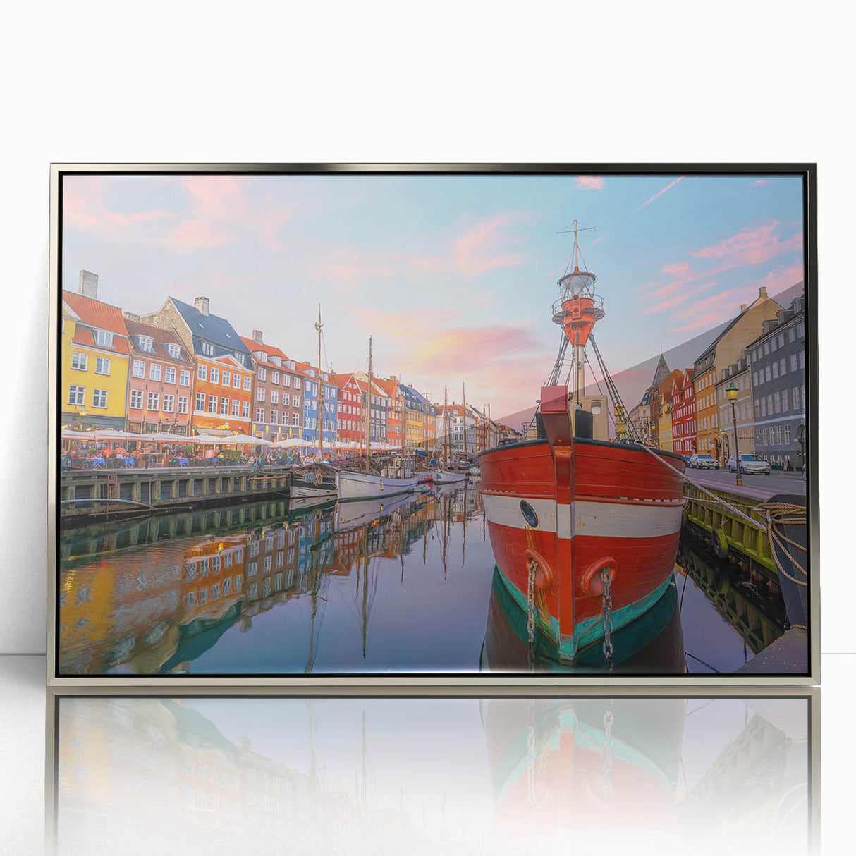 Large art print of a serene European landscape in muted greens and blues, framed in silver acrylic.