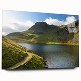 Large abstract wall art depicting Cumbria's scenery in muted green and blue tones on acrylic glass.