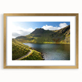 Abstract art print of Cumbrian landscape with muted earth tones on a gold-framed canvas, suitable for dining room decor.