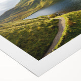 Art deco poster of Cumbria landscape in soft green and blue tones on rolled canvas, suited for dining room walls.