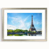 Extra large wall art featuring an abstract textured print of a Paris scenery in muted gray tones, framed in silver.