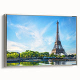 Framed canvas featuring a vintage-style Paris landscape in black with colorful accents, ideal for living room decor.
