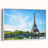Vintage poster art of a Parisian scene in vibrant colors on a large framed canvas, ideal for living room decor.