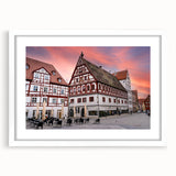 Textured art depicting an abstract Bavarian landscape in muted earth tones on a framed white mat.