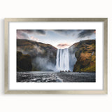 Extra large abstract art print of Icelandic scenery in muted blues and grays, framed in silver, ideal for living room decor.