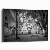 Black and white framed canvas of Barcelona landscape, ideal for bedroom wall art with a vintage poster style.