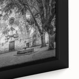 Extra large framed canvas of a textured Barcelona cityscape in black with colorful accents, ideal for living room decor.