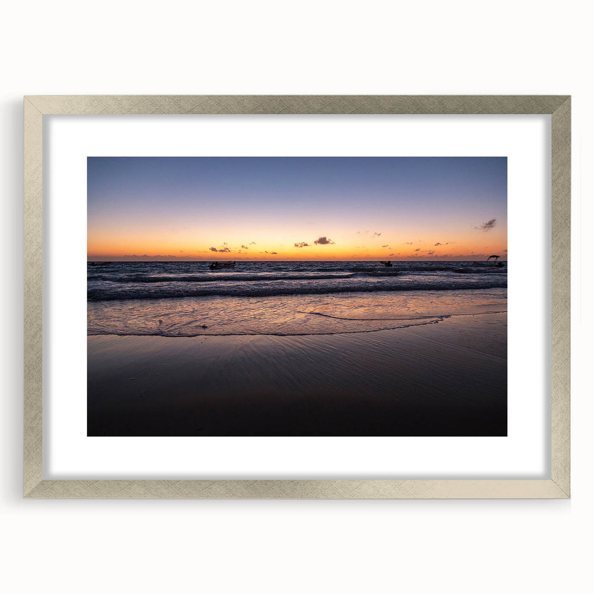Textured abstract art print of Yucatan scenery in muted earth tones, framed in silver, suitable for bedroom decor.