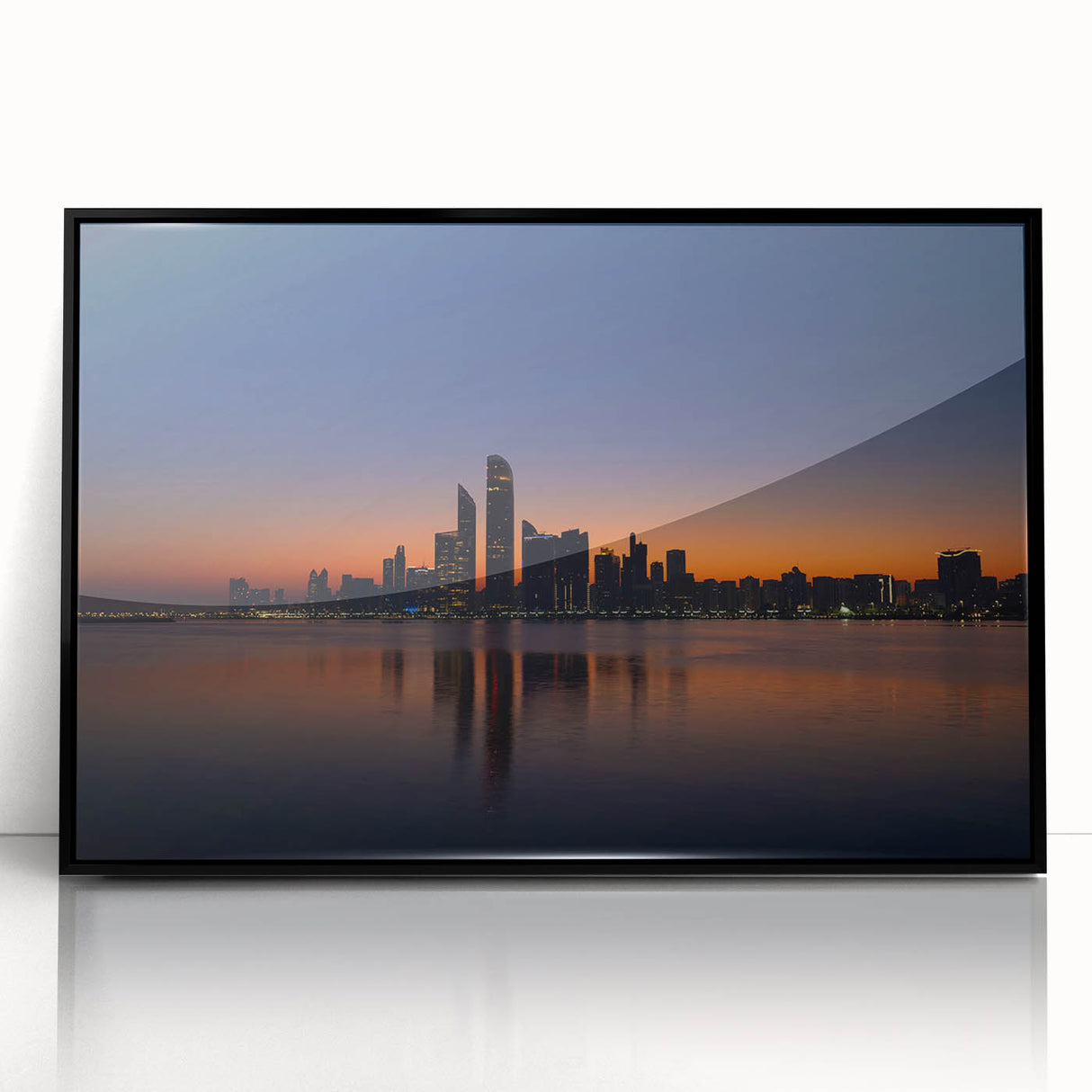 Large abstract wall art of Abu Dhabi skyline in muted black and gray tones on a framed acrylic.