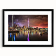 Colorful abstract art print of Auckland scenery on textured canvas, framed in black, ideal for living room decor.