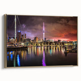 Framed canvas of Auckland landscape with vintage poster style in black and gold tones, ideal for bedroom wall art.