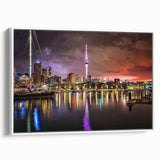 Vintage poster art of Auckland skyline in colorful hues on a large framed canvas, ideal for living room decor.