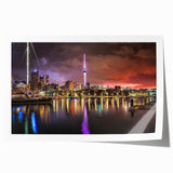 Extra large rolled print of Auckland skyline with muted blue and gray tones, suitable for dining room wall art.
