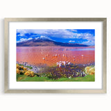 Textured abstract art print of a Bolivian landscape in muted earth tones, framed in silver, suitable for bedroom decor.