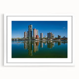 Abstract art print of a Brazilian landscape in muted earth tones on a framed white mat.