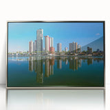 Mid-century modernist art depicting a scenic view of a Brazilian landscape in soft earth tones on a silver-framed acrylic…