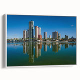 Vintage poster art of a Brazilian landscape in vibrant colors on a white framed canvas, ideal for living room decor.