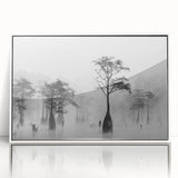 Art deco poster of Louisiana scenery in muted green and blue tones, acrylic print framed in white.