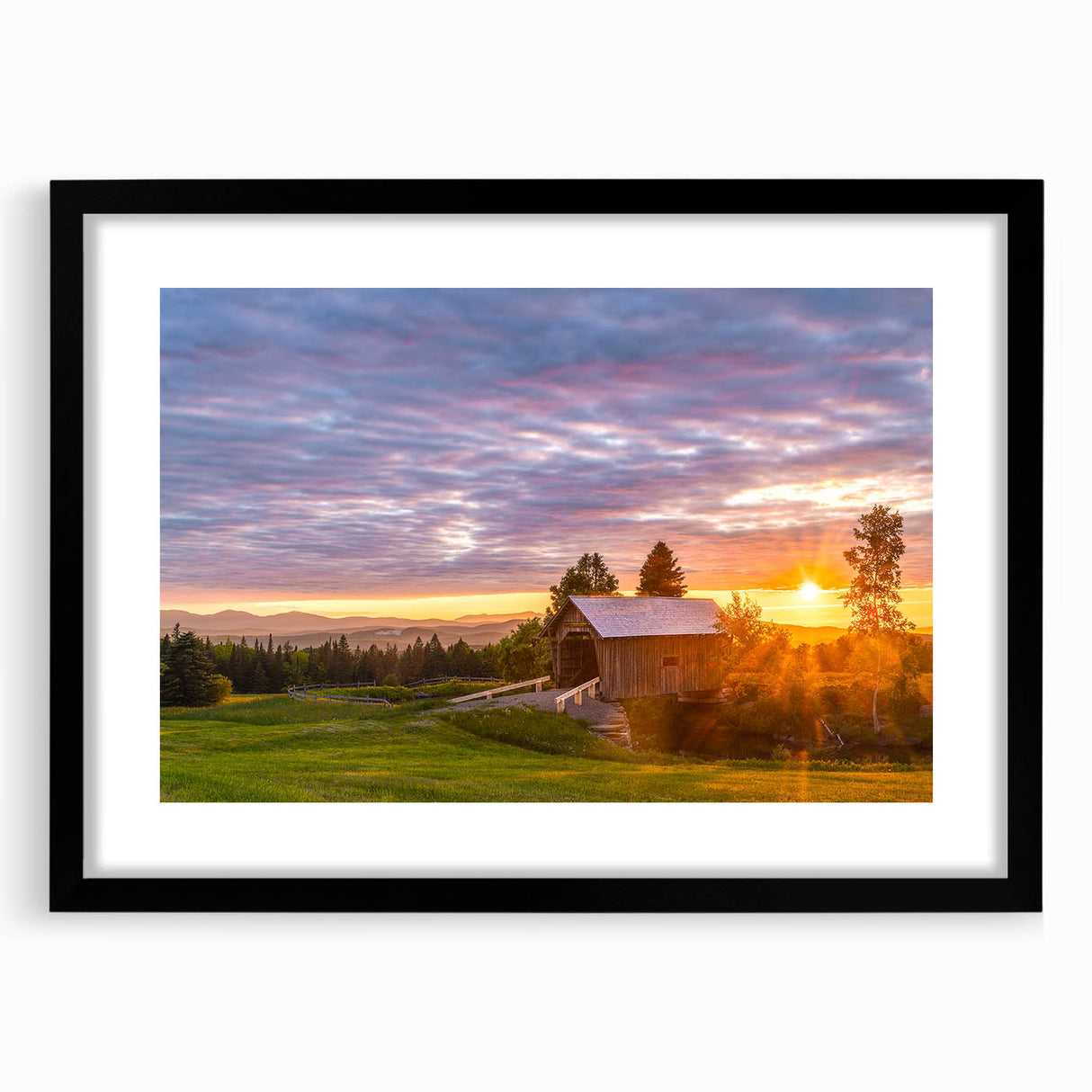 Abstract art print featuring vibrant colors and textured design in a black frame, ideal for living room decor.