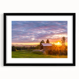 Abstract art print featuring vibrant colors and textured design in a black frame, ideal for living room decor.